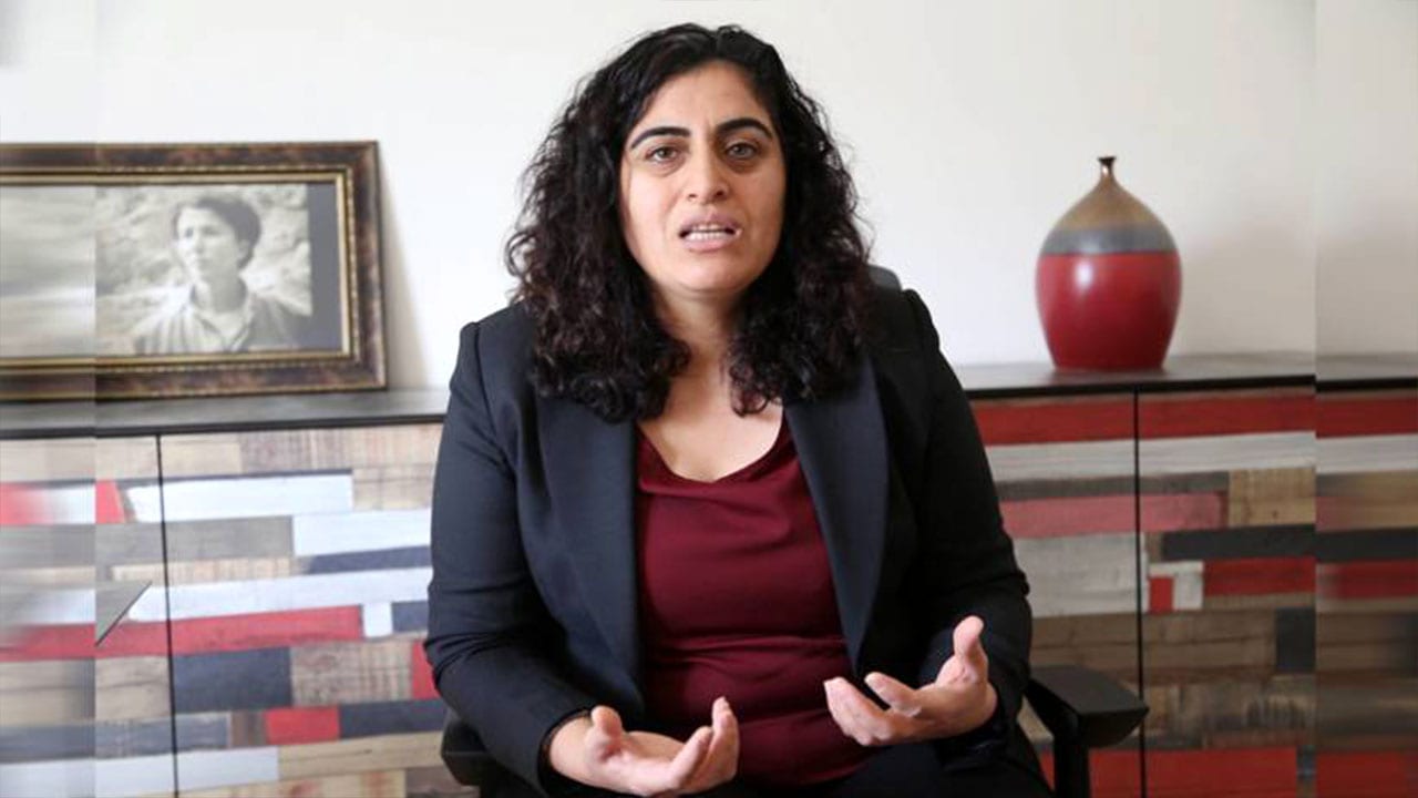 Jailed Kurdish politican Sebahat Tuncel protests against policies of isolation, war and oppression