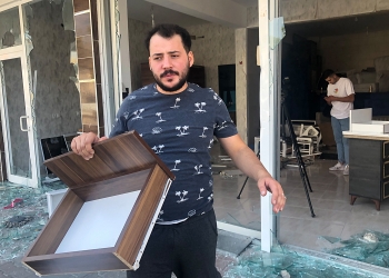 Business run by Turkish man with Syrian partner among those looted during racist attacks in Ankara