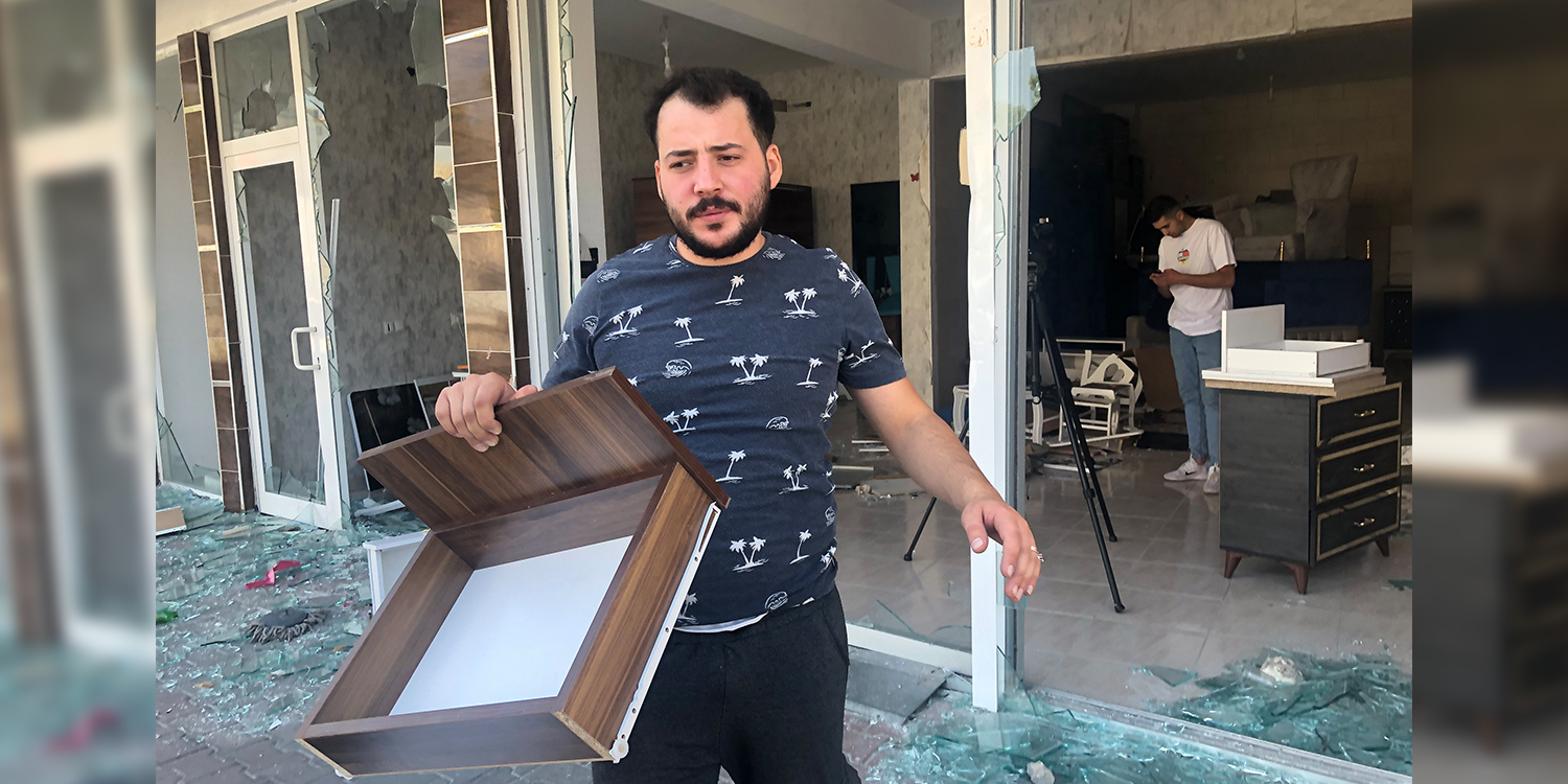 Business run by Turkish man with Syrian partner among those looted during racist attacks in Ankara