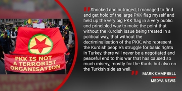 Why I held up a very large PKK flag on a London demonstration and got myself arrested.