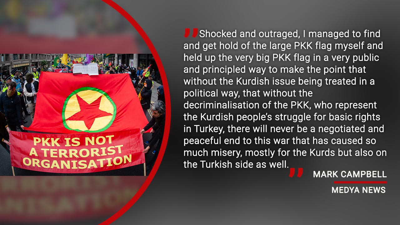 Why I held up a very large PKK flag on a London demonstration and got myself arrested.