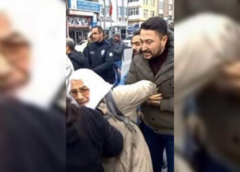 Turkish police beat elderly woman during demonstration