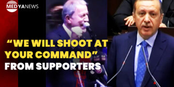 Turkish Defence Minister encourages chants of “We will shoot at your command” from supporters