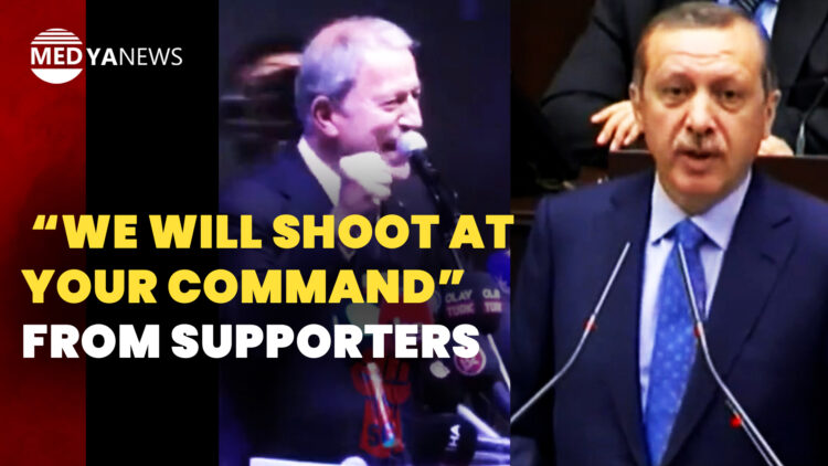 Turkish Defence Minister encourages chants of “We will shoot at your command” from supporters
