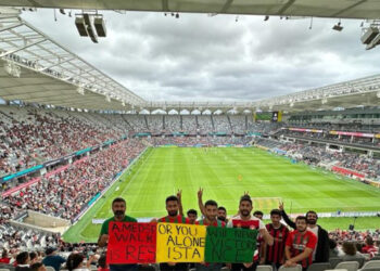 Protests against racist attacks on Kurdish football team at Sydney match