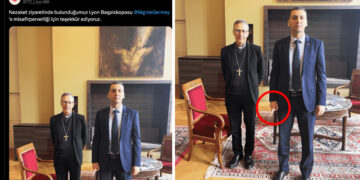 Turkish diplomat deletes photo after making jihadist gesture during Archbishop visit