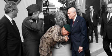 Turkish police officers line up to kiss hand of far-right leader