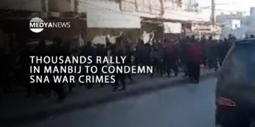 Thousands rally in Manbij to condemn SNA war crimes