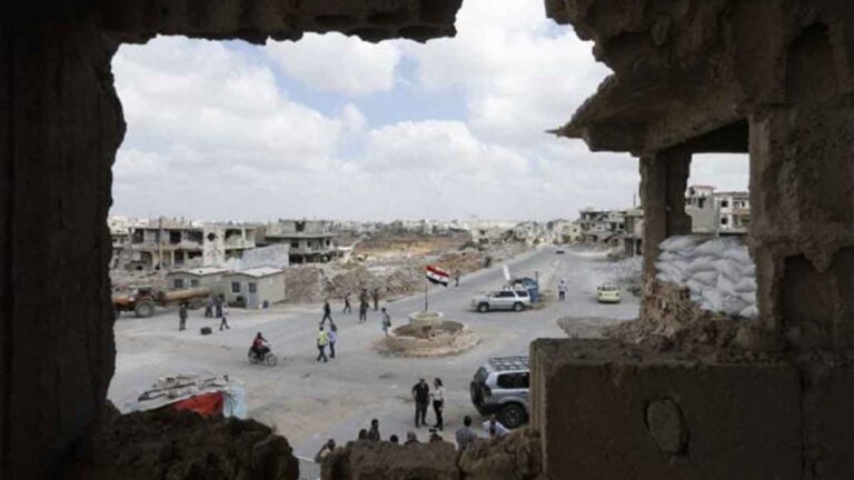 Jihadist groups advance through strategic provinces as Assad’s forces collapse