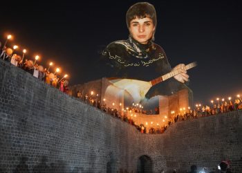 Women light Newroz fire on Diyarbakır’s ancient walls, honouring Kurdish resistance