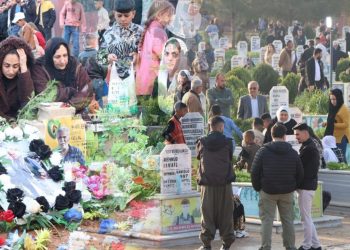 Residents of North and East Syria visit martyrs’ graveyards on first day of Eid