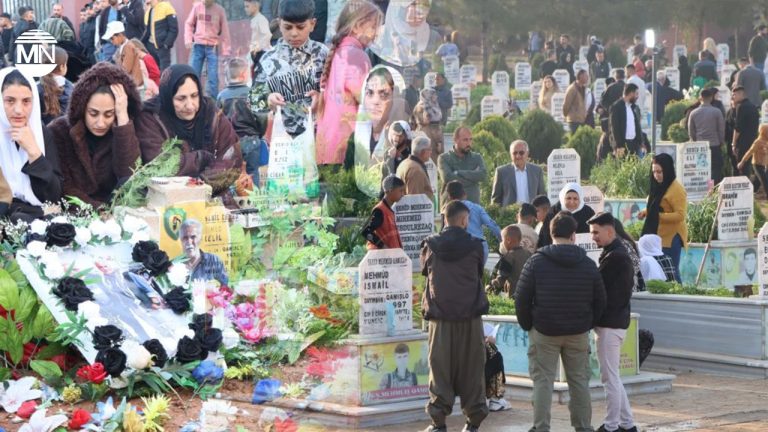 Residents of North and East Syria visit martyrs’ graveyards on first day of Eid